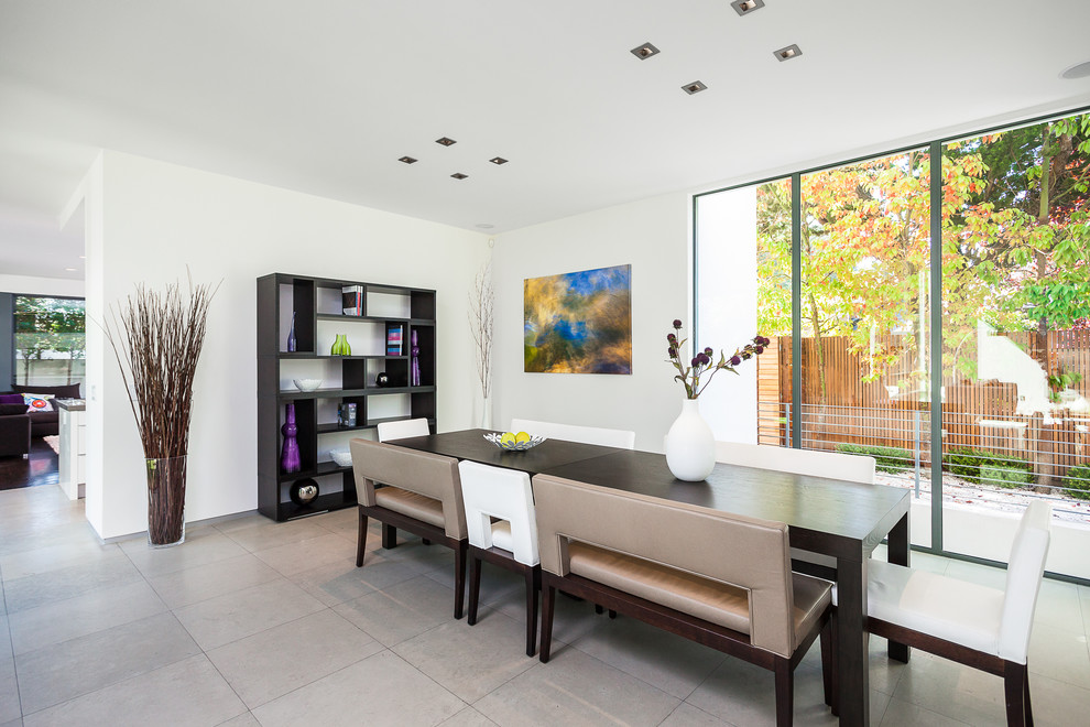 Photo of a contemporary dining room in San Francisco with white walls.