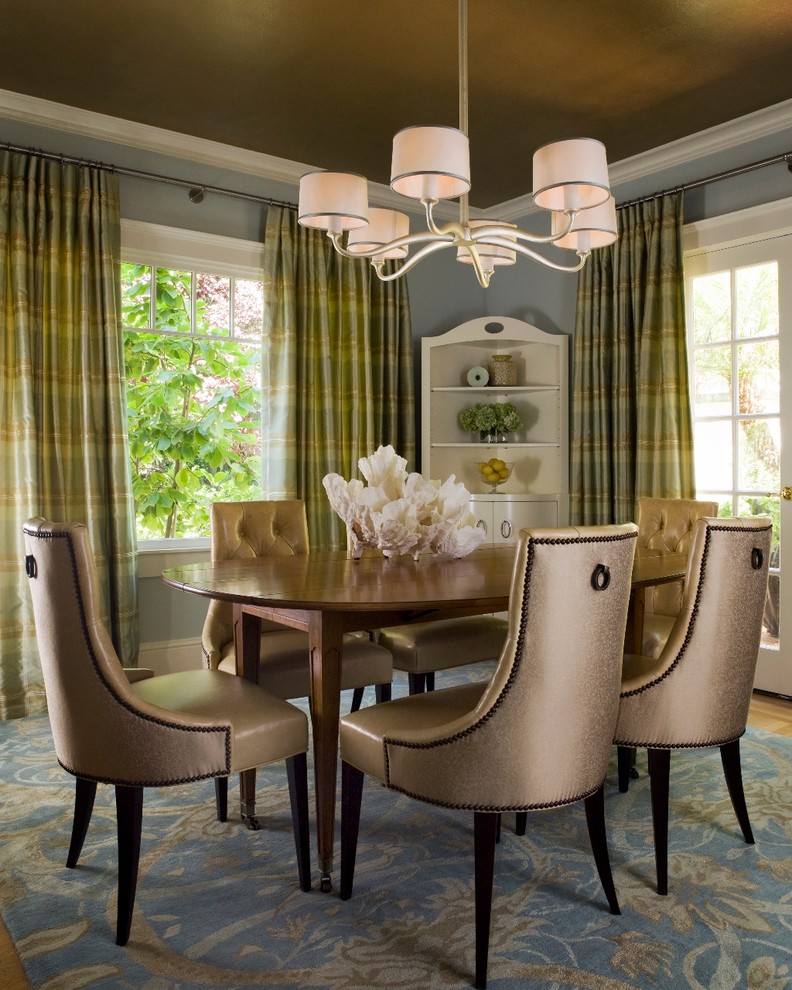 Enclosed dining room - mid-sized transitional medium tone wood floor and brown floor enclosed dining room idea in San Francisco with blue walls and no fireplace