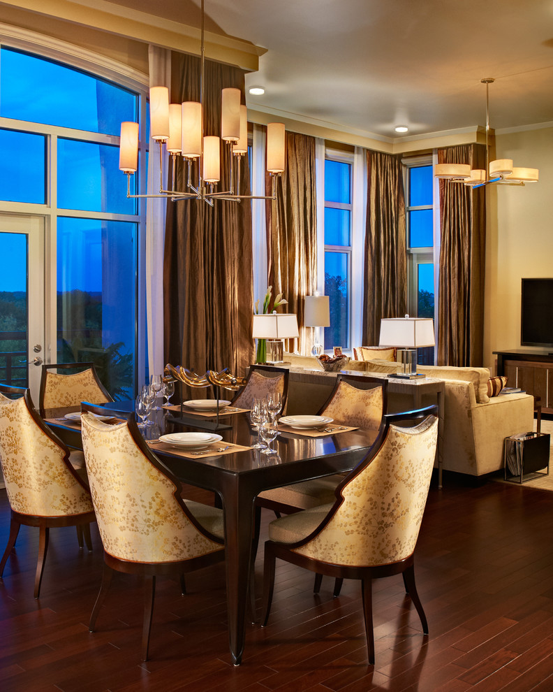 Inspiration for a timeless dark wood floor dining room remodel in Raleigh with beige walls