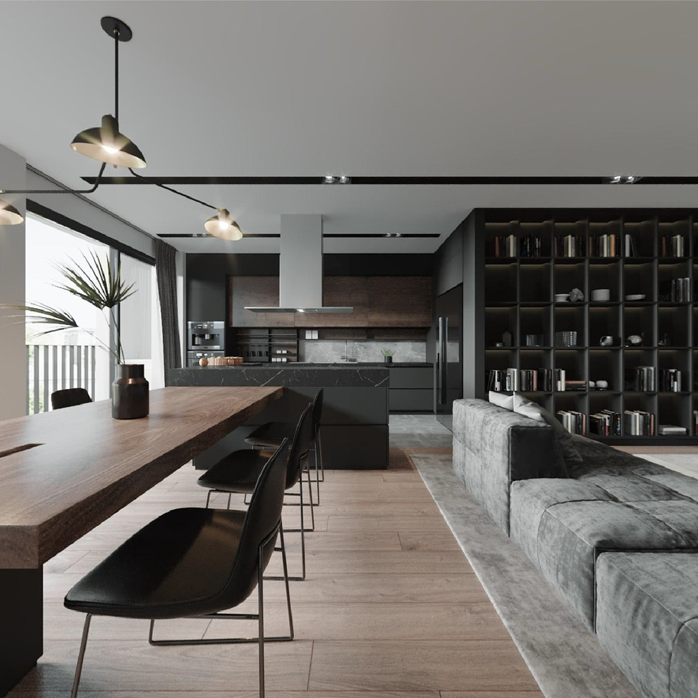 Idee per una grande sala da pranzo aperta verso la cucina bohémian con pareti grigie, pavimento in legno massello medio e pavimento marrone