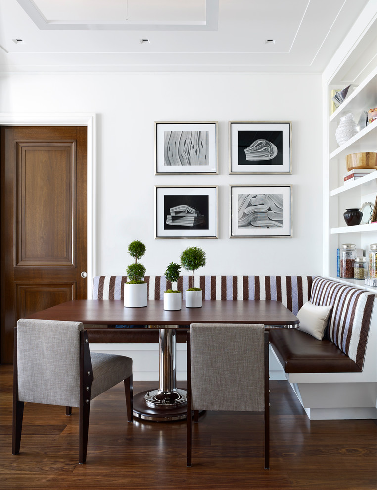 Design ideas for a classic dining room in New York with white walls, dark hardwood flooring and no fireplace.