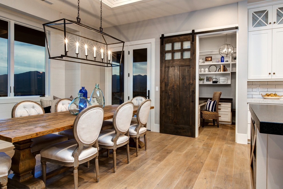Photo of a nautical kitchen/dining room in Salt Lake City with grey walls and light hardwood flooring.