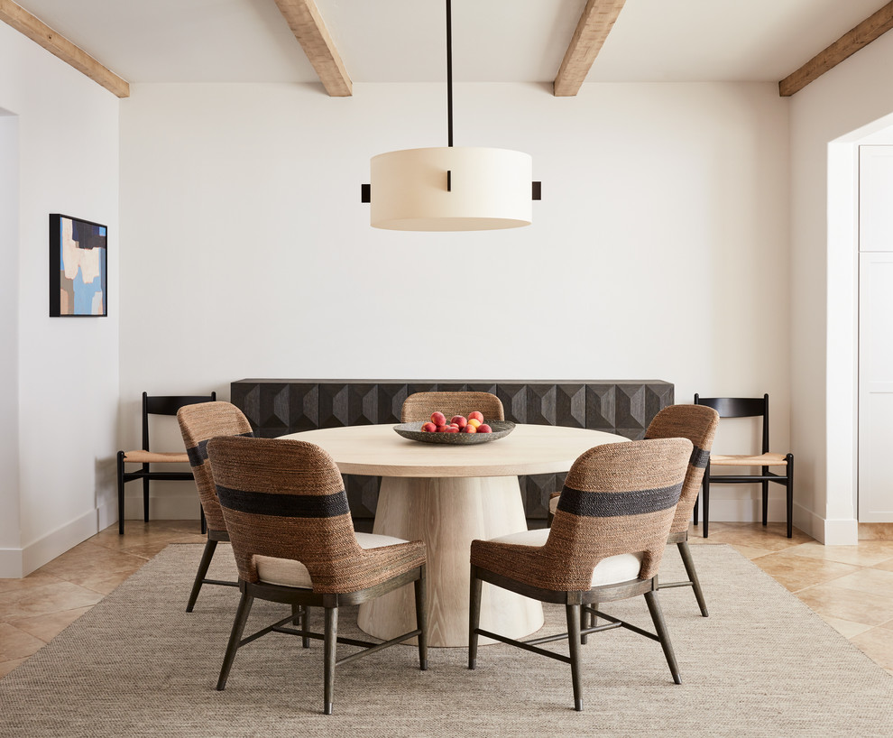 Photo of a medium sized beach style dining room in San Luis Obispo with white walls, no fireplace, beige floors and travertine flooring.