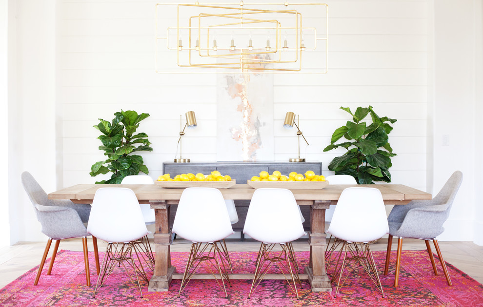 Large retro open plan dining room in Phoenix with white walls, light hardwood flooring, no fireplace, grey floors and feature lighting.