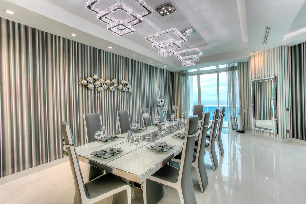 Expansive contemporary kitchen/dining room in Miami with multi-coloured walls, porcelain flooring and no fireplace.