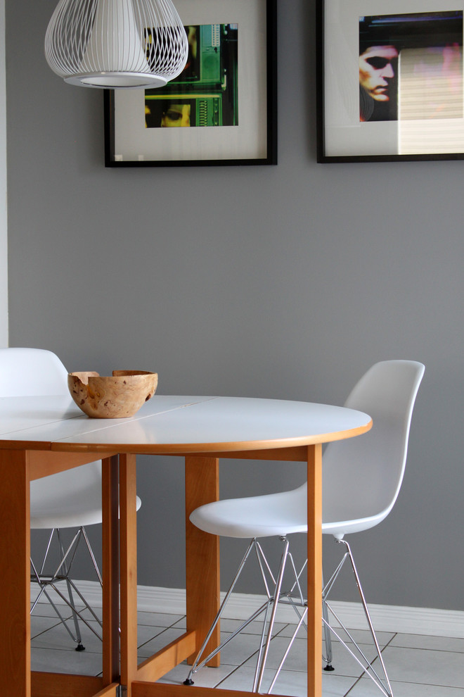 Inspiration for a contemporary dining room in Ottawa with grey walls.
