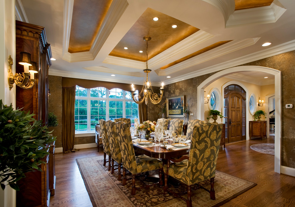 Enclosed dining room - traditional dark wood floor enclosed dining room idea in Philadelphia with brown walls
