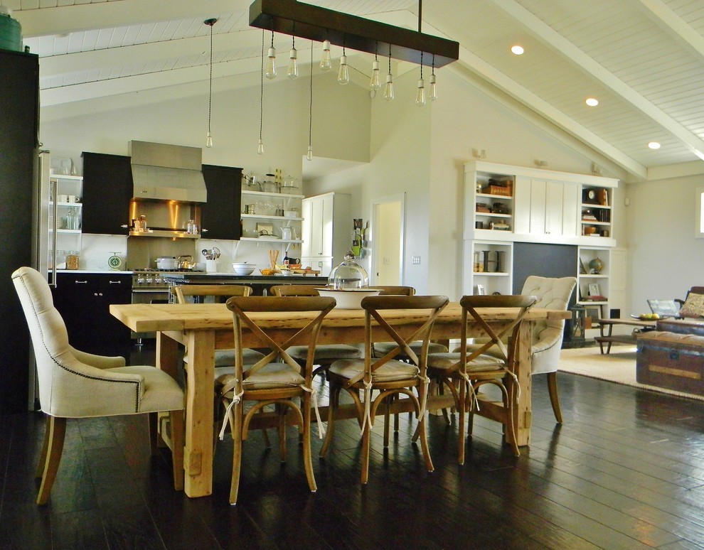 Inspiration for a cottage dark wood floor great room remodel in Seattle with white walls