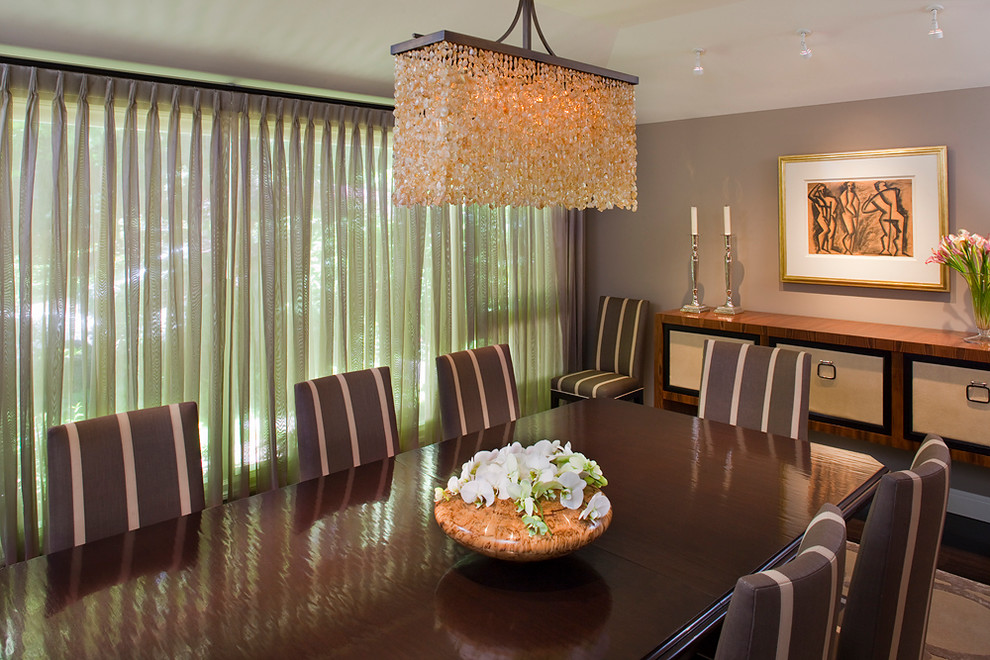 Inspiration for a mid-sized contemporary dark wood floor and brown floor enclosed dining room remodel in San Francisco with beige walls and no fireplace