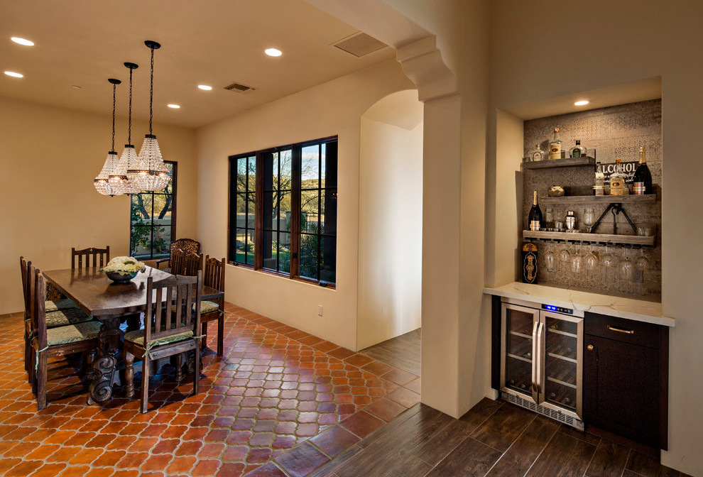 Inspiration for a traditional kitchen/dining room in Phoenix with white walls.