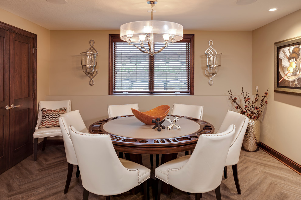 This is an example of a medium sized contemporary dining room in Minneapolis with beige walls and vinyl flooring.