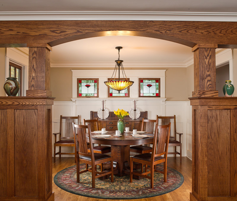 Inspiration for a medium sized traditional enclosed dining room in Atlanta with beige walls, medium hardwood flooring, no fireplace and brown floors.