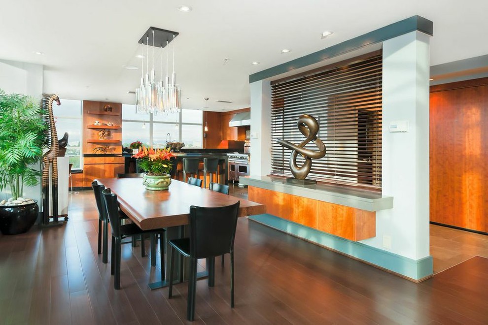 Design ideas for a contemporary dining room in Seattle with medium hardwood flooring.