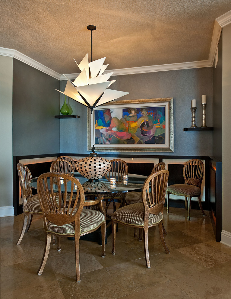 This is an example of a contemporary dining room in Tampa with grey walls.