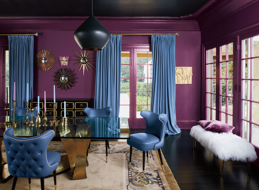 Photo of a large eclectic enclosed dining room in Los Angeles with pink walls, dark hardwood flooring, no fireplace and brown floors.