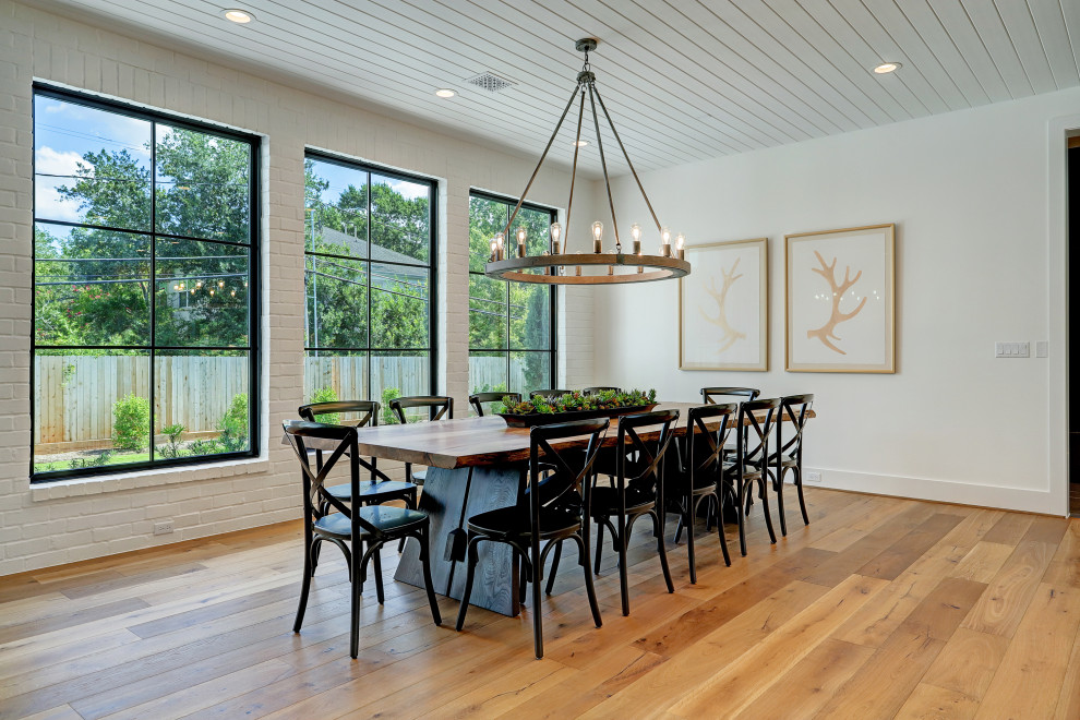 Dining room - cottage dining room idea in Houston