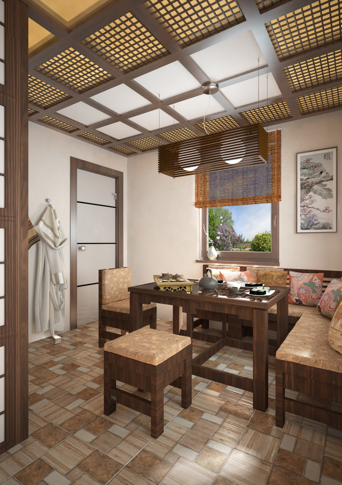 Example of a small zen enclosed dining room design in New York with beige walls