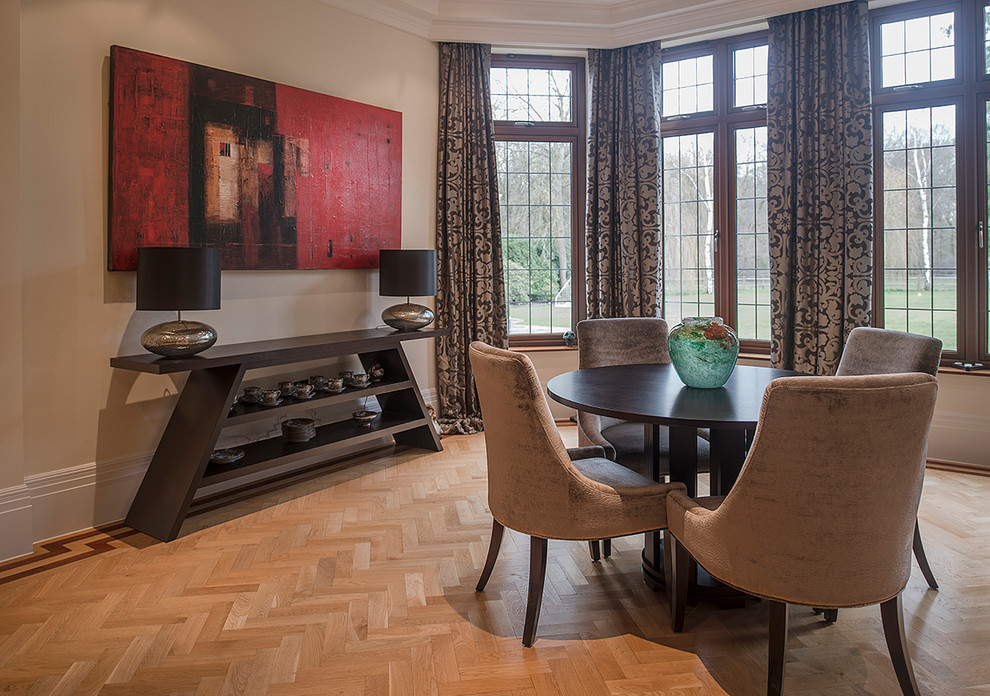 Example of a trendy dining room design in Hampshire