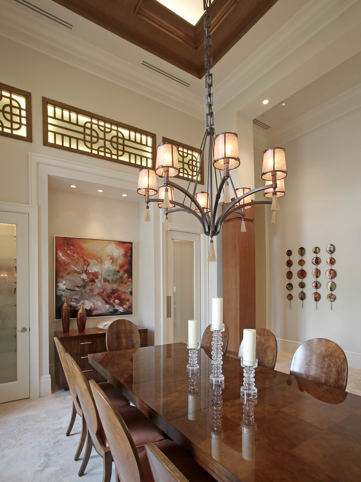 Classic dining room in Miami with white walls.