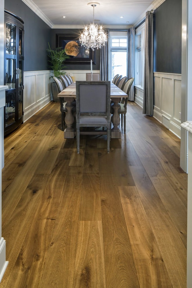Design ideas for a classic dining room in Calgary with light hardwood flooring.