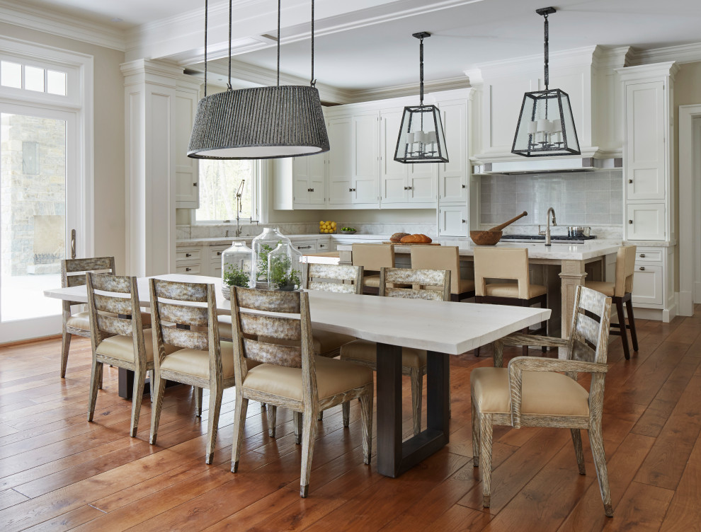 Inspiration for a transitional medium tone wood floor and brown floor kitchen/dining room combo remodel in Chicago with beige walls and no fireplace