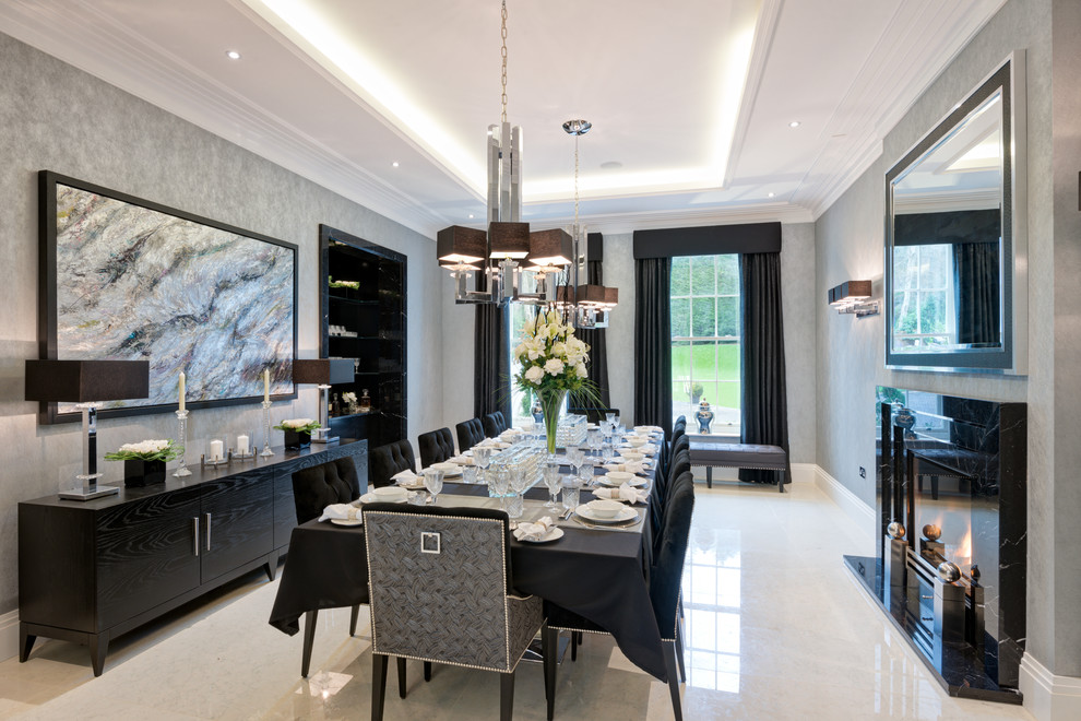 Example of a classic dining room design in Surrey