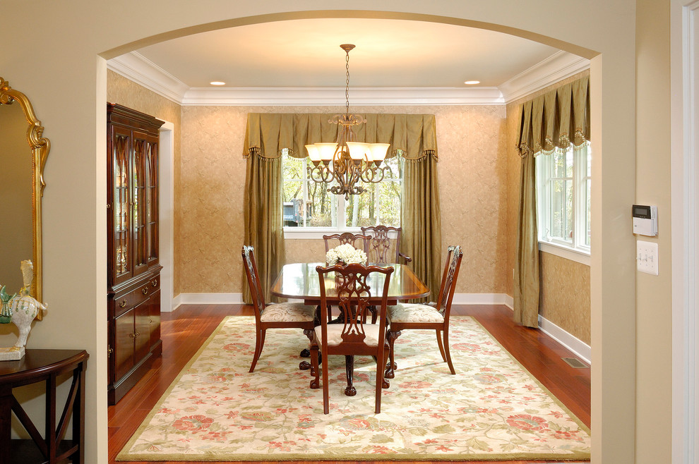Inspiration for a mid-sized timeless dark wood floor enclosed dining room remodel in Philadelphia with beige walls and no fireplace