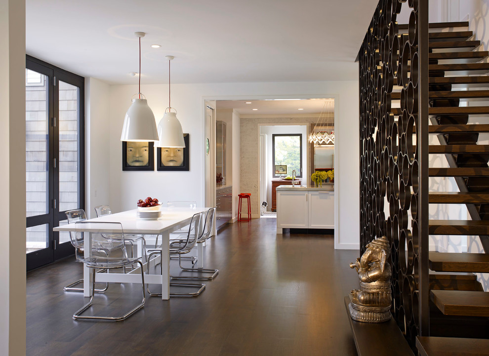 Inspiration for a contemporary dining room remodel in Detroit with white walls