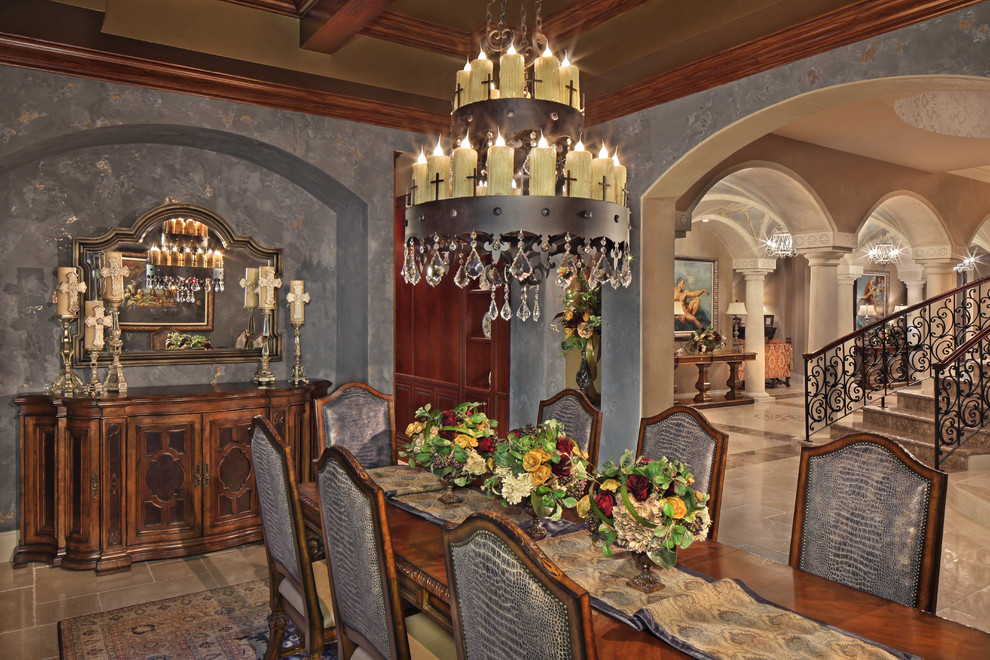 Inspiration for a mediterranean dining room in Miami with grey walls.