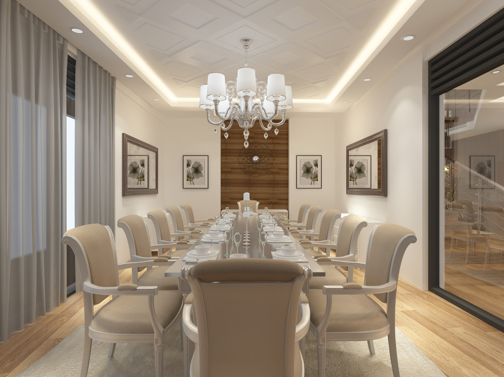 Idées déco pour une salle à manger ouverte sur la cuisine moderne de taille moyenne avec un mur blanc et un sol en bois brun.