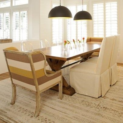 Medium sized contemporary dining room in Phoenix with white walls, medium hardwood flooring and no fireplace.