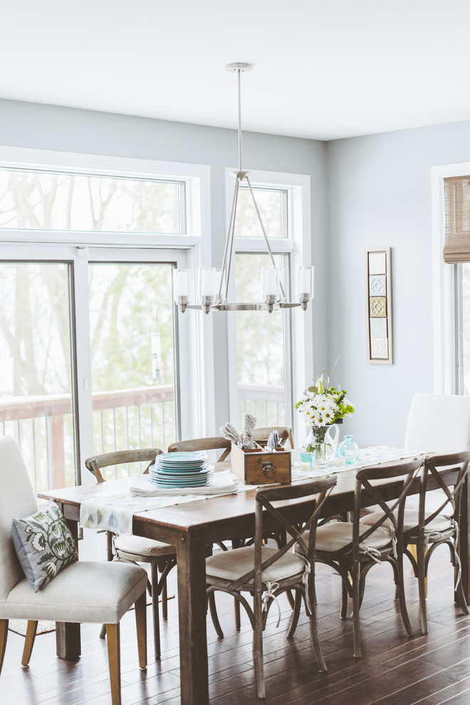 Inspiration for a shabby-chic style dark wood floor dining room remodel in Minneapolis with gray walls