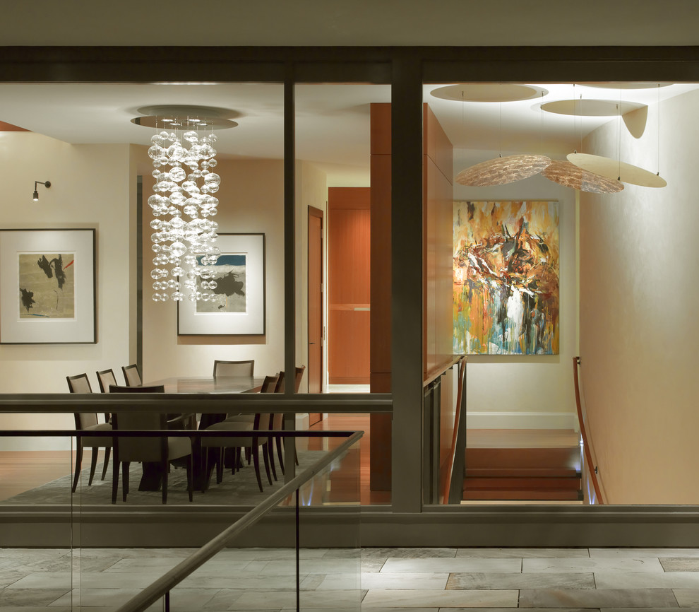 Trendy medium tone wood floor dining room photo in San Francisco with beige walls