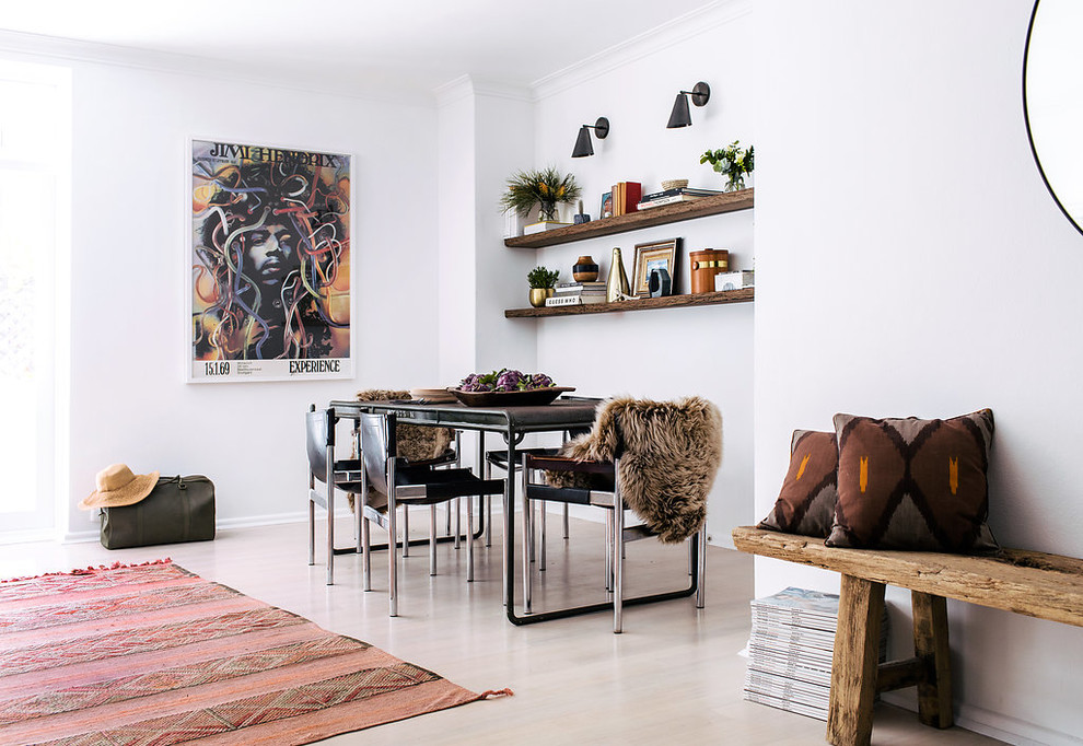 Scandinavian open plan dining room in Sydney with white walls, light hardwood flooring and beige floors.