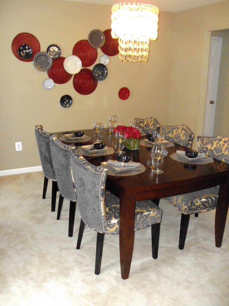 Inspiration for a small transitional carpeted enclosed dining room remodel in DC Metro with beige walls