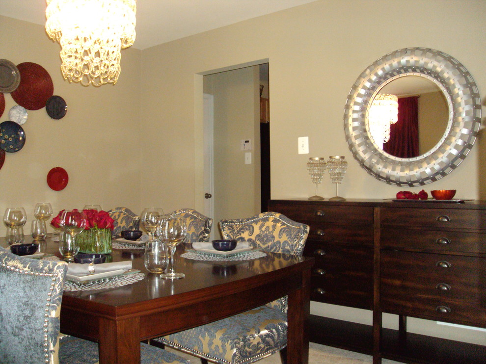Example of a small transitional carpeted enclosed dining room design in DC Metro with beige walls