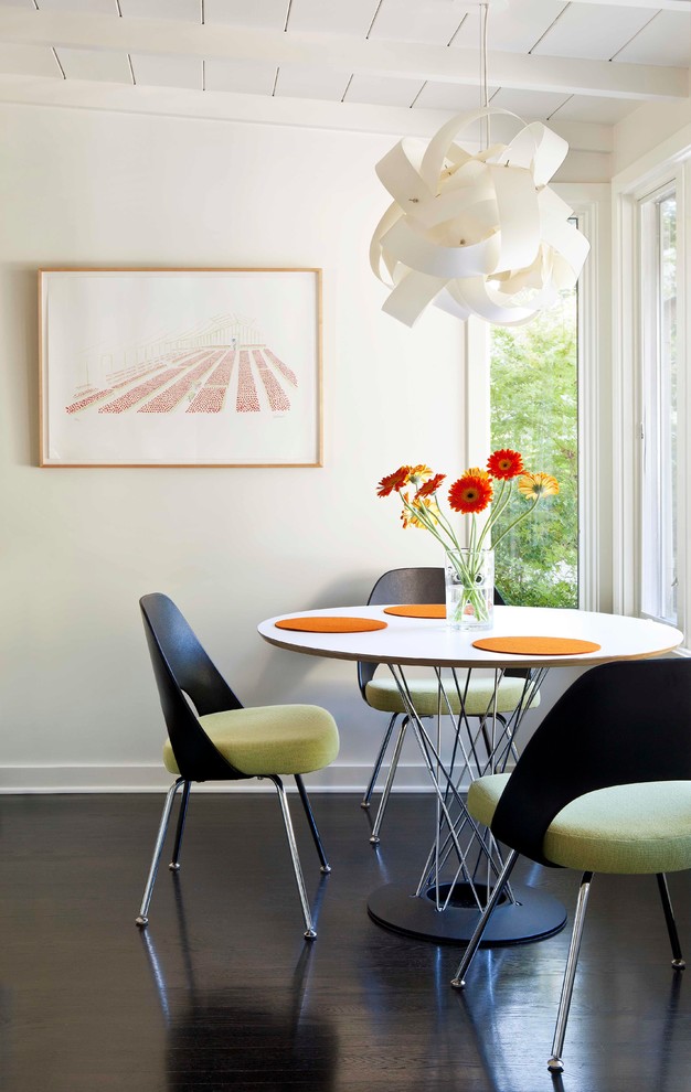 Dining room - modern dark wood floor dining room idea in Los Angeles with white walls