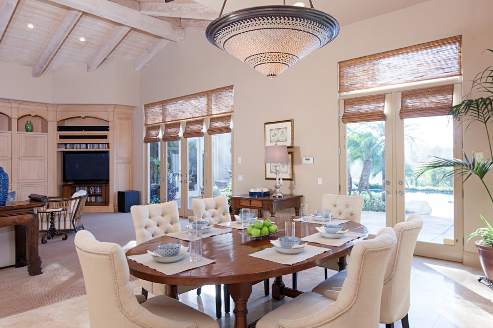 Photo of a large mediterranean kitchen/dining room in San Diego with beige walls.