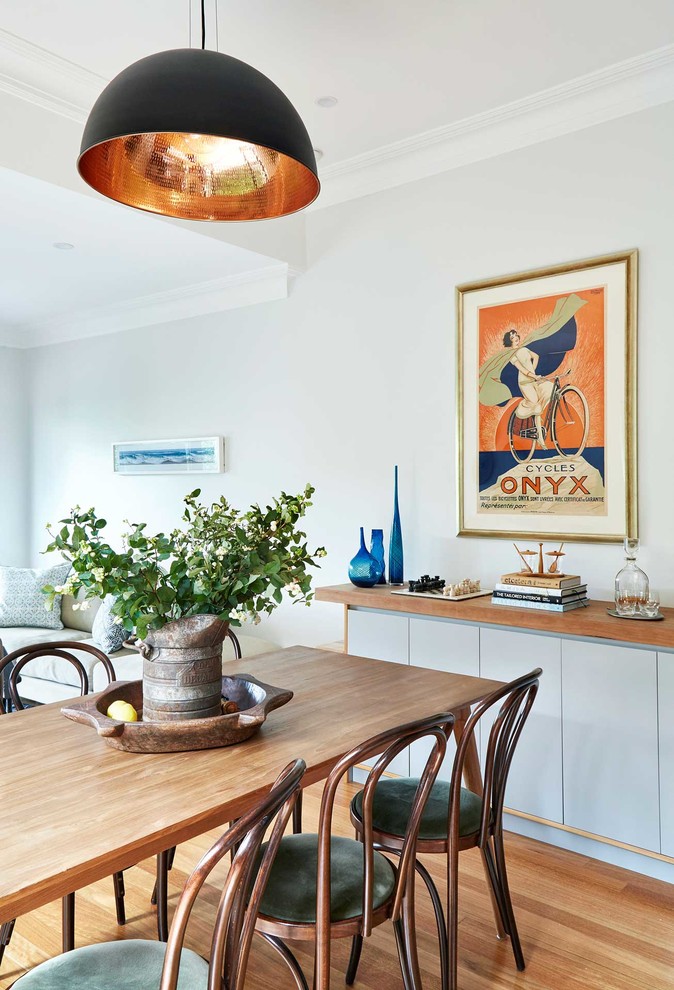 Dining room - transitional light wood floor dining room idea in Sydney