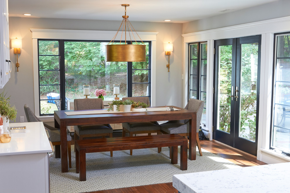 Inspiration for a transitional dark wood floor dining room remodel in New York with gray walls