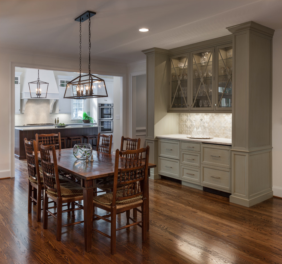 Mid-sized transitional dark wood floor and brown floor kitchen/dining room combo photo in Charlotte with white walls