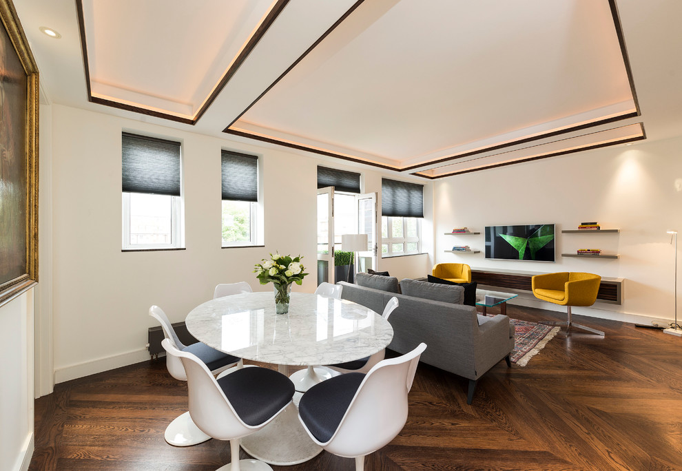 Design ideas for a contemporary open plan dining room in London.