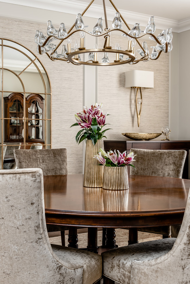 Inspiration for a medium sized traditional enclosed dining room in Toronto with beige walls, medium hardwood flooring, no fireplace and brown floors.