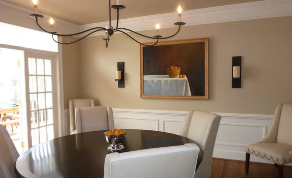 Dining room - country dark wood floor and brown floor dining room idea in DC Metro with beige walls