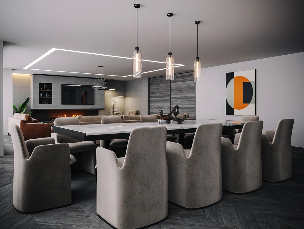 This is an example of a large contemporary open plan dining room in London with grey walls, a ribbon fireplace, a tiled fireplace surround and grey floors.