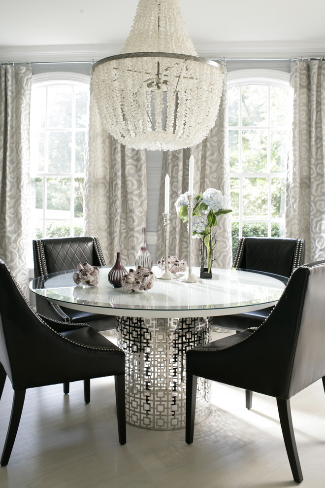 Inspiration for a contemporary light wood floor dining room remodel in Raleigh with gray walls