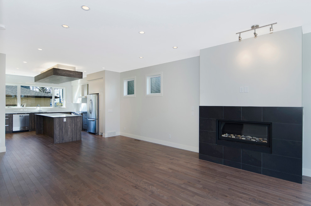 Example of a minimalist dining room design in Calgary