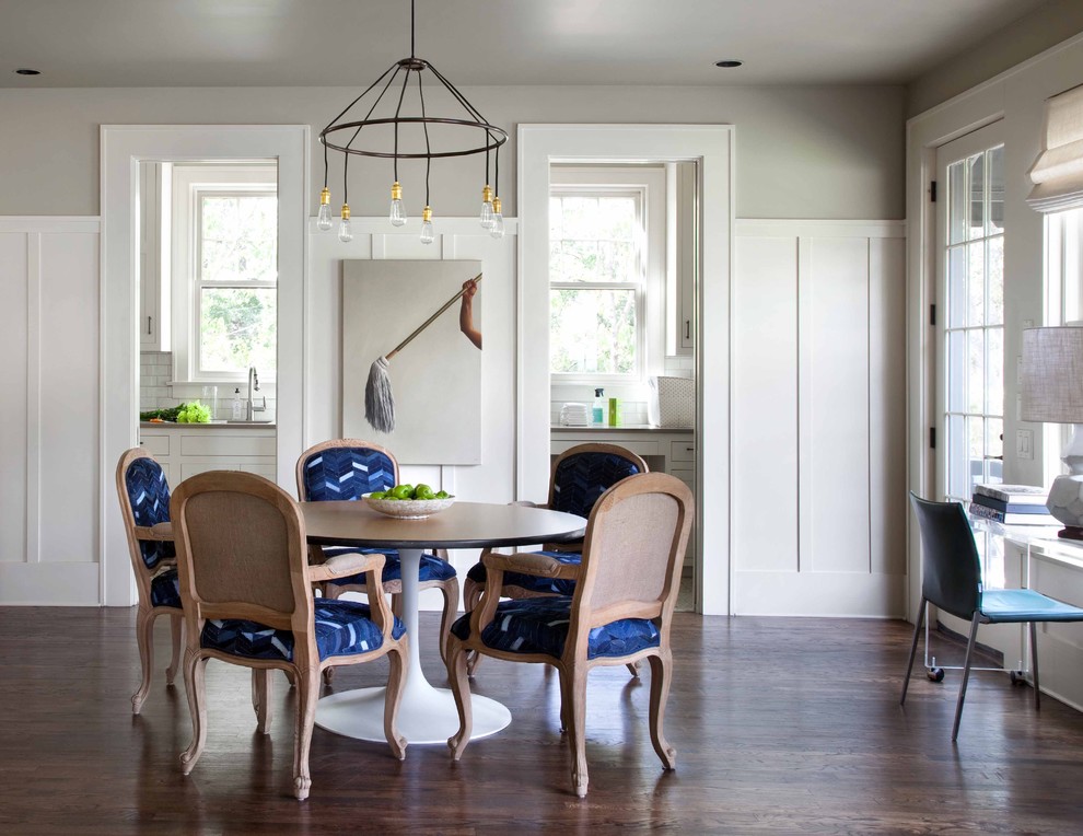 Trendy dark wood floor dining room photo in Austin with gray walls
