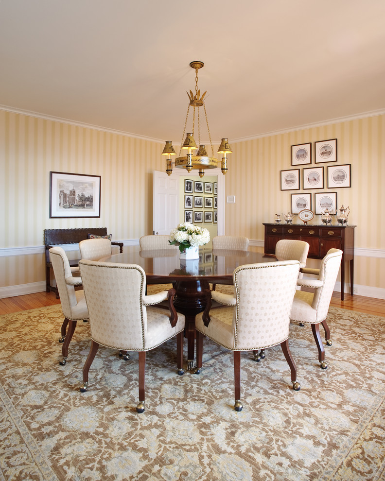Classic dining room in Richmond with yellow walls.