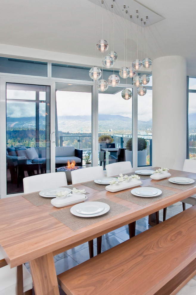 Design ideas for a contemporary dining room in Vancouver with white walls.